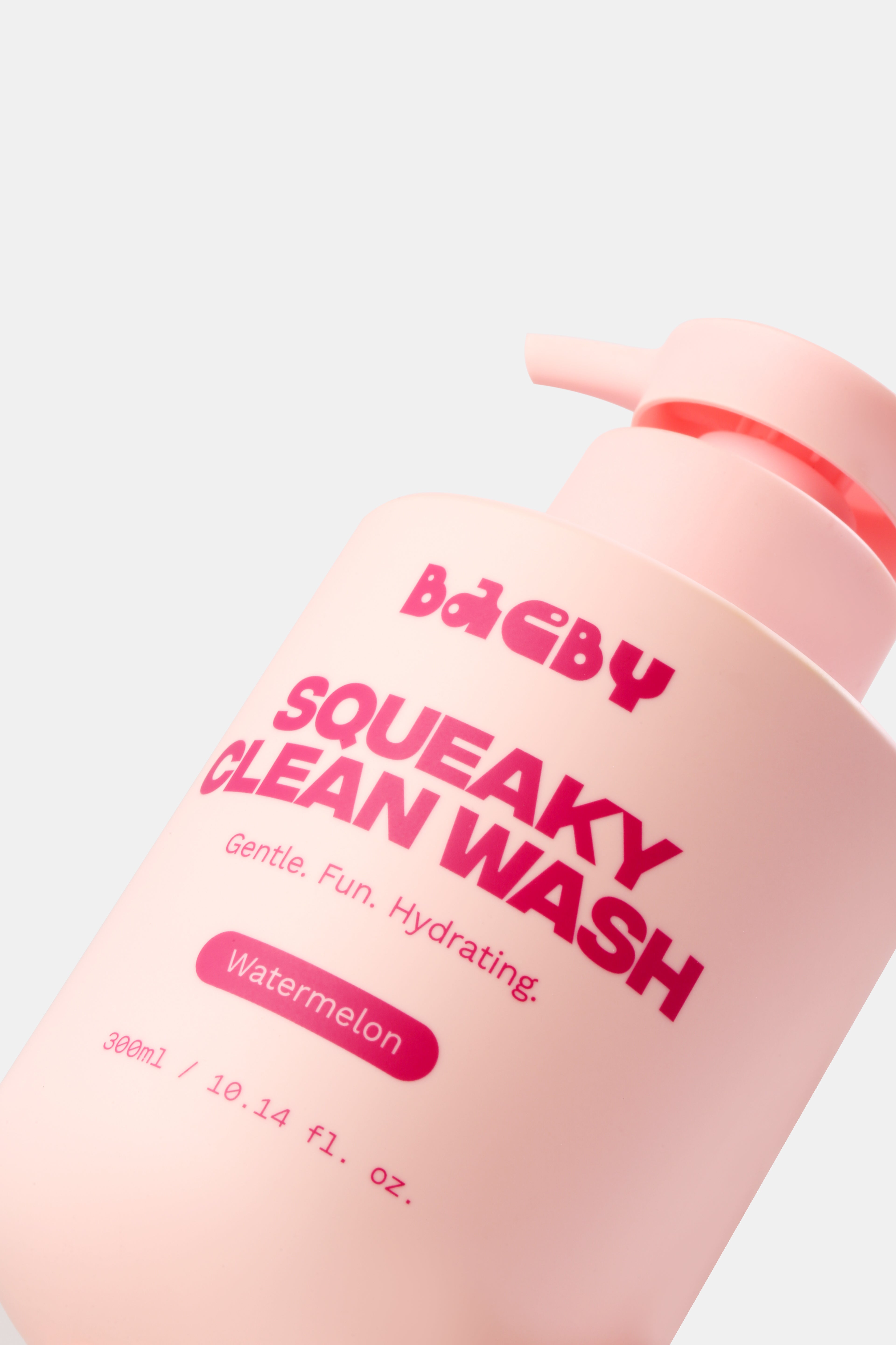 Pink bottle of Baeby Squeaky Clean Wash with red text on a light pink background